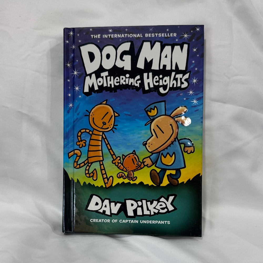 Scholastic Dog Man: Mothering Heights - Purple Blue Green Cover